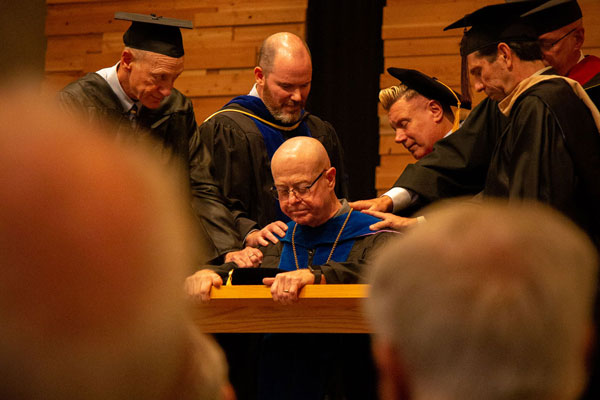 Chuck Conniry gets prayer from Western leaders