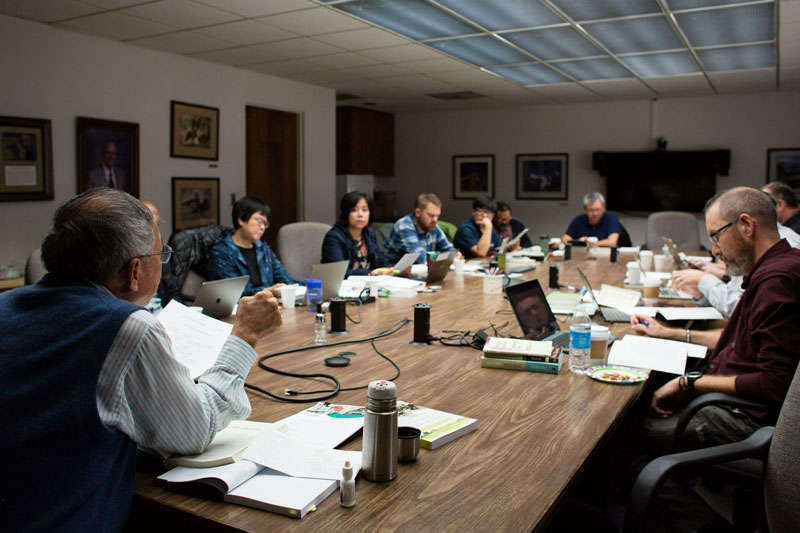 students in classroom with Dr. Wan